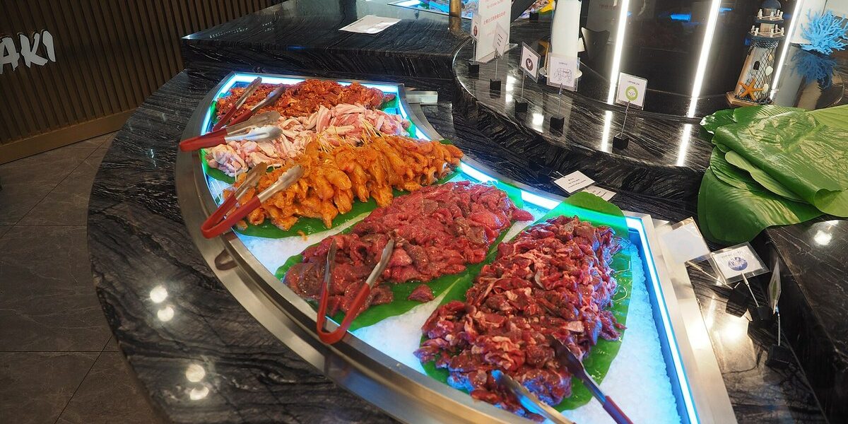 Hibachi at home menu ideas with teppanyaki meats and vegetables ready to cook for a private chef dinner