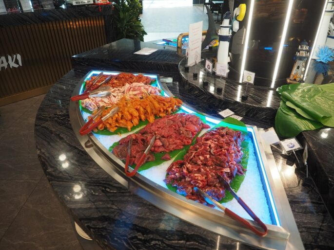 Hibachi at home menu ideas with teppanyaki meats and vegetables ready to cook for a private chef dinner