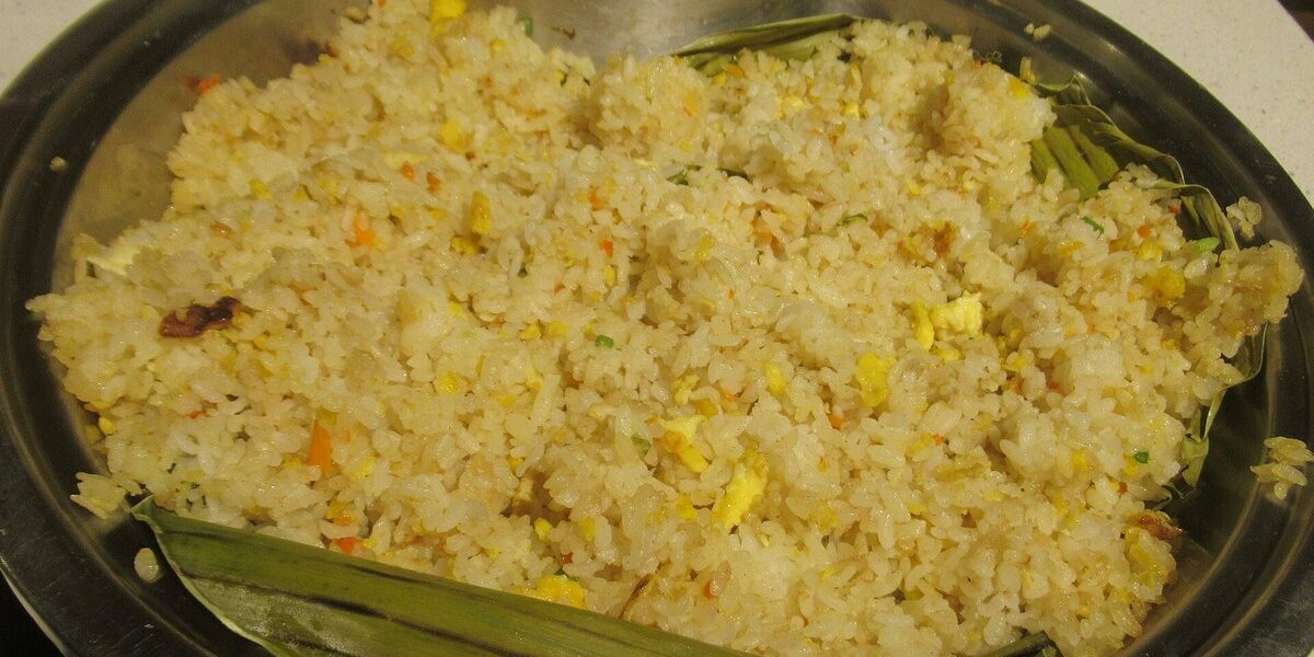 Japanese hibachi fried rice served in a bowl with the classic golden color of a teppanyaki side dish Japanese hibachi fried rice served in a bowl with the classic golden color of a teppanyaki side dish