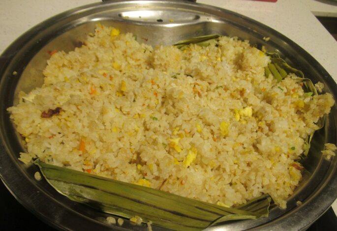 Japanese hibachi fried rice served in a bowl with the classic golden color of a teppanyaki side dish