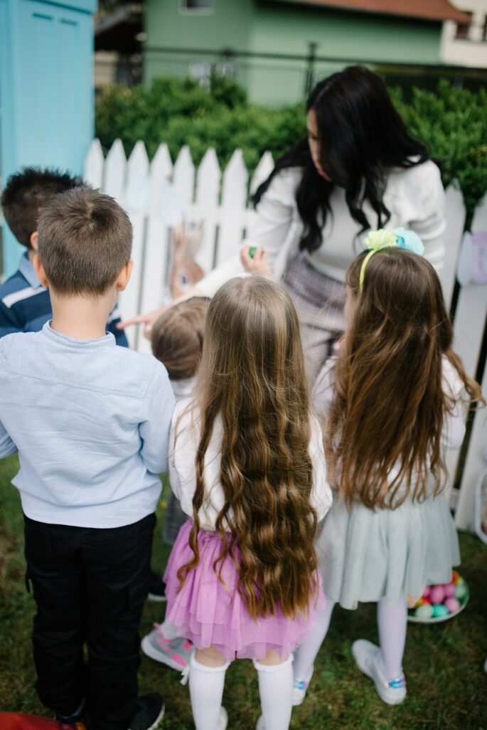 Children playing outdoors at a garden birthday party, a fun setting for hibachi party games at home