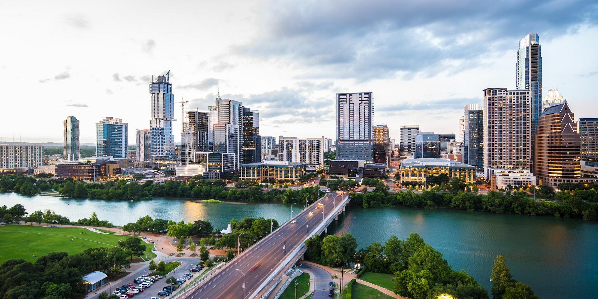 Austin Texas skyline at dusk over Lady Bird Lake—backdrop for backyard hibachi at home catering