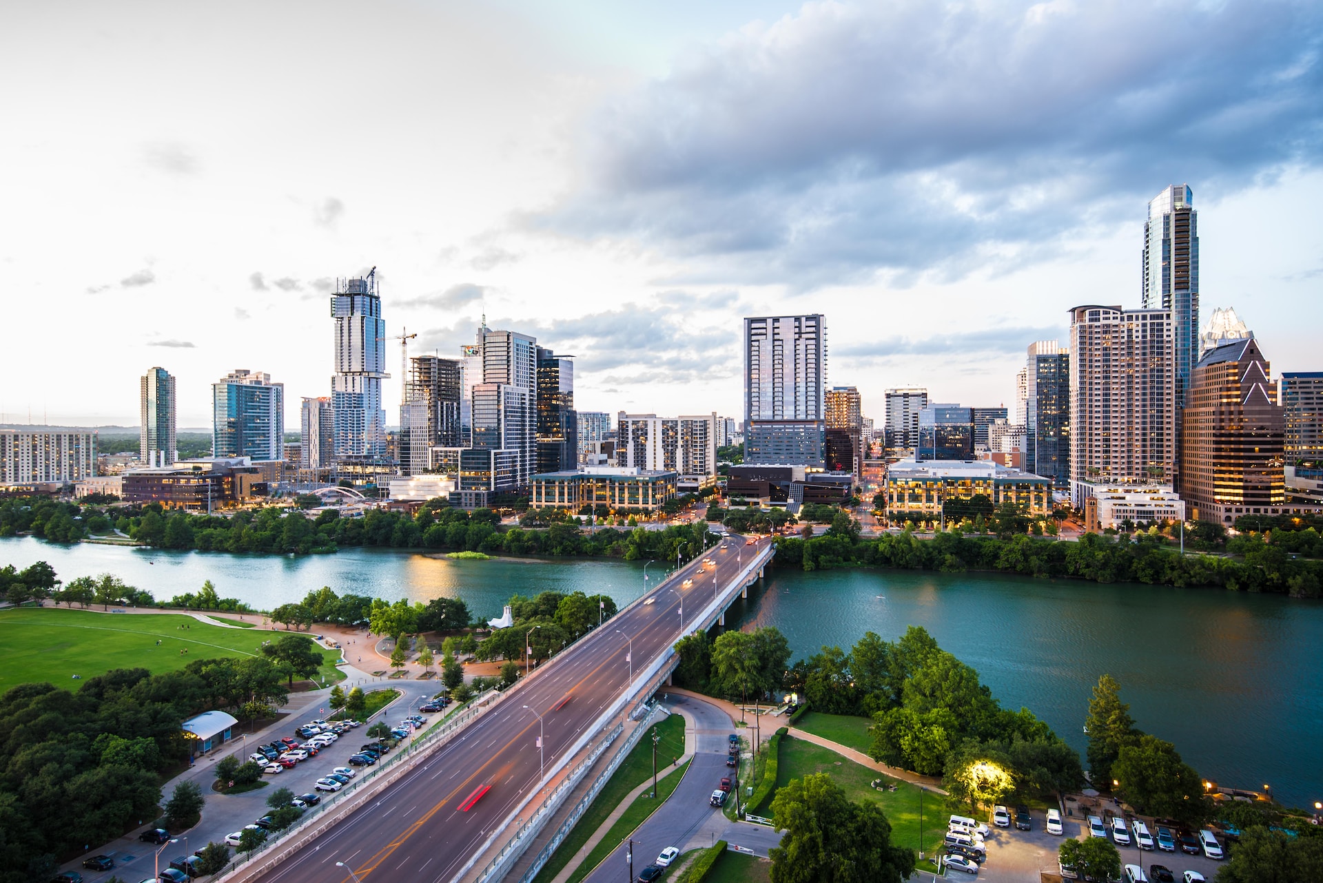 Austin Texas skyline at dusk over Lady Bird Lake—backdrop for backyard hibachi at home catering